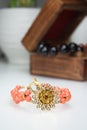 Jewelry Coral Bracelet with Filigre Flower Royalty Free Stock Photo