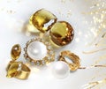 Jewelry gold rings  white pearl and  natural yellow citrine gem stone and white pearl gold ring with  christal diamonds on pin Royalty Free Stock Photo