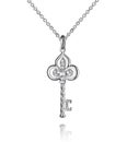Jewelry golden pendant with diamonds, key, golden chain, white gold, isolated on white