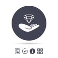 Jewelry insurance sign. Hand holds diamond.