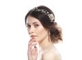 jewelry, luxury, wedding and people concept: young bride with gorgeous diadem in her hair Royalty Free Stock Photo