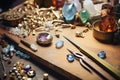 Jewelry makers table with tools, gold bars, precious stones. Generative AI