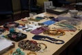 jewelry-making workshop, with beading and stringing materials laid out for attendees