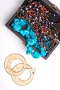 Jewelry old box and blue bead necklace. Isolated on a white background. Royalty Free Stock Photo