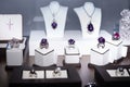 Jewelry retail store showcase displaying white gold rings with amethysts and diamonds Royalty Free Stock Photo