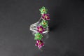 Jewelry ring with Natural Green Sapphire and ruby in shape of flower. Royalty Free Stock Photo