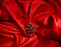 Jewelry ring over red silk background Royalty Free Stock Photo