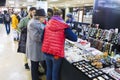 People browsing a jewelry gift stall Royalty Free Stock Photo