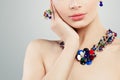 Jewelry woman. Colorful necklace, ring and earrings portrait