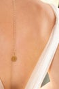 Jewels on girl neck beautiful back gold necklace in evening bride dress sexy woman