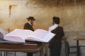 Jewish bible on table, wailing western wall, jerusalem, israel. book of the Torah-the Pentateuch of Moses is open on the prayer Royalty Free Stock Photo