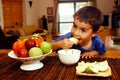 Jewish boy eats Apple in Honey Royalty Free Stock Photo