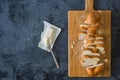 Jewish challah bread, sliced on black background