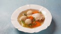 Jewish chicken broth with kneidlach (balls made with matzo meal). Matzo ball soup