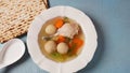 Jewish chicken broth with kneidlach (balls made with matzo meal). Matzo ball soup