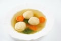 Jewish chicken broth with kneidlach (balls made with matzo meal). Matzo ball soup