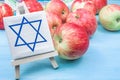 Jewish concept of the harvest festival, apples on the table . background of religion