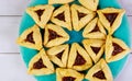 Jewish cookies pattern for Purim on wooden background