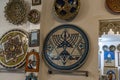 Jewish Craftsman painting and decorating ceramic products in pottery factory in Fez, Morocco.