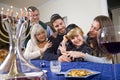 Jewish family celebrating Chanukah Royalty Free Stock Photo