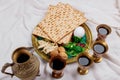 Passover matzoh jewish holiday bread with kiddush four cup of wine Royalty Free Stock Photo
