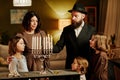 Jewish Family Lighting Menorah Candle