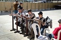 Jewish family praying in Jerusalem