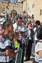 The Jewish family prays with the prayer book