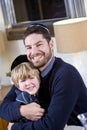 Jewish father and young son wearing yarmulkes