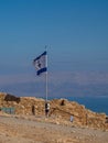 Jewish flag on top of the Masada fortress, Israel