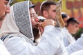 Jewish hasid blows Shofar. Rosh Hashanah, Jewish New Year.