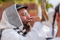 Jewish hasid blows Shofar. Rosh Hashanah, Jewish New Year.