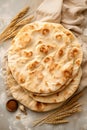 Jewish holiday bread matzah on kitchen table. Stask of matza or matzoh. Happy Passover