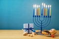 Jewish holiday Hanukkah background with menorah, sufganiyot, gif Royalty Free Stock Photo