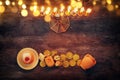 jewish holiday Hanukkah background with traditional spinnig top, menorah & x28;traditional candelabra& x29; and burning candles Royalty Free Stock Photo