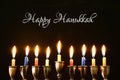 jewish holiday Hanukkah background with traditional spinnig top, menorah & x28;traditional candelabra& x29; and burning candles.