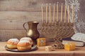 Jewish holiday Hanukkah celebration with vintage menorah