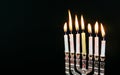 Jewish holiday Hanukkah creative background with menorah. View from above focus on .