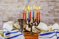 Jewish holiday Hanukkah creative background with menorah. View from above focus on . Royalty Free Stock Photo