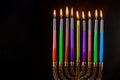 Jewish holiday Hanukkah with hanukkiah menorah on nine candles