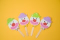 Jewish holiday Purim background with childish paper clowns Royalty Free Stock Photo