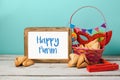 Jewish holiday Purim concept with hamantaschen cookies or hamans ears and carnival mask Royalty Free Stock Photo