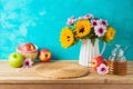 Jewish holiday Rosh Hashana background with honey jar, apples and sunflowers on wooden table. Kitchen counter for product display Royalty Free Stock Photo