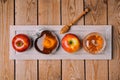 Jewish holiday Rosh Hashana celebration with wooden board, honey and apples on table. View from above. Royalty Free Stock Photo