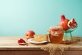 Jewish holiday Rosh Hashanah background with honey jar, apple an Royalty Free Stock Photo