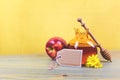 Jewish holiday Rosh Hashanah background with honey jar and apple on table Royalty Free Stock Photo