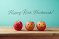 Jewish holiday Rosh Hashanah background with smiling apples Royalty Free Stock Photo