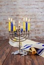 Jewish holiday Tallit Lighting Hanukkah Candles celebration Royalty Free Stock Photo