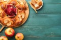 Jewish Holidays - Rosh Hashanah or Rosh Hashana. Pomegranate, apples, honey and round challah on old wooden blue table background