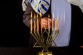 Jewish man blessings Chanukah menorah traditional Hanukkah